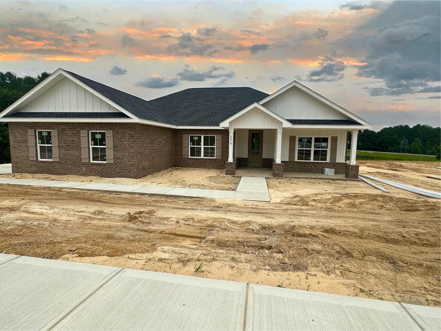 Huge Lake front homesite. NEW Home currently under construction!  This home will be complete with exterior brick and hardy accents. The home has 4 bedrooms 2 baths. Open floor plan for family and friend get togethers.  Beautiful lake view from the picture window in the breakfast area. Side entry garage. Located at the South end of Crestview with new growth and just a short drive to beaches, bases, local schools, hospital, south Publix, restaurants, and Crestview Commons, Hwy 85 and I-10 are in close proximity to the property. Photos are sample of similar build.