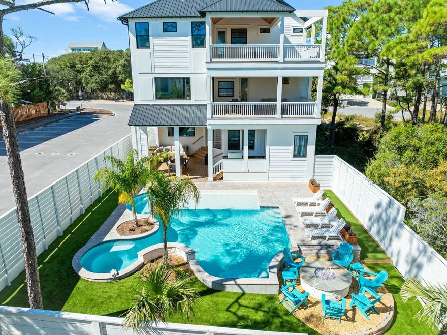Pine and Palm at 58 Santa Clara is a newly custom-built, amenity-rich vacation home, perfectly situated just off 30A in Seagrove Beach. This luxury home was designed with meticulous attention to detail featuring 6-bedroom plus bunk room and offers incredible Gulf views. This 5400 square foot home was built in 2024 and includes resort-style amenities inside and out. A large pool complete with a hot tub with waterfall, a cozy fire pit, and a putting green. Entertainment options abound with a theatre room and a game room equipped with a card table, gaming console, shuffleboard, and pool table. There is living room on each floor as well as outdoor porches. Over $390k in rental projections with current rental company with 2025 booking up quickly and expected to exceed $390k. The fourth floor is a true highlight, offering expansive covered space with forever views of the Gulf of Mexico, perfect for enjoying sunset.  Accommodating up to 26 guests, each of the six bedrooms boasts en suite bathrooms with double vanities, large walk in closets, while the bunk room features two full bathrooms perfect for kids, teens and guests.  

The first floor has a master bedroom and a spacious open-concept living and kitchen area that seamlessly extends to the backyard oasis, creating an ideal setting for relaxation and entertainment. 

The covered porch on the main level provides a serene view of the resort-inspired pool, complete with a built-in grill extending from the kitchen. The second level features 2nd bedroom with private bathroom and porch. As well as a3rd bedroom with private bathroom and a connected hallway with bunks. This floor also includes a secondary living area with a game room, media room, half bathroom, beverage station, and a large covered porch overlooking the pool.

On the third level, you'll find two additional bedrooms with king-size beds and en-suite bathrooms, along with a spacious bunk room connecting to two full bathrooms. A sitting area, video game console, beverage station, and another expansive outdoor porch offer views of the lush Seagrove landscape.

The fourth floor is a true highlight of the home featuring a viewing deck with expansive Gulf views. Thoughtfully designed for enjoyment even on less-than-ideal weather days, Pine and Palm boasts four large outdoor living areas, ensuring ample space for all guests as well as numerous indoor entertainment. 

Located just north of Santa Clara Beach, this coveted spot offers the best beach access along 30A, complete with a ramp, seasonal lifeguards, and restrooms. 
An investor's dream, this property is offered turn-key, including an electric 2023 6-seater golf cart (with EV charger in garage) and over $390k in rental projections for 2025. Built in 2024, the calendar is already filling up with 14 weeks booked for 2025. Experience the ultimate in luxury at 58 Santa Clara located in the heart of Seagrove Beach's Gulf Shore Manor, a non-HOA neighborhood offering 1400 linear feet of pristine beach access. This exquisite home is perfectly positioned just a mile from Seaside and 1.5 miles from Watercolor, with the newly opened Greenway Station for shopping and dining to the east.

