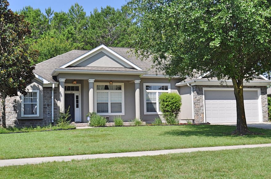 Gorgeous design and appeal with this 4 bedroom, 3 bath home in Orchard at Hammock Bay. Owners have made numerous updates since purchase and has just freshly painted. This is a very well laid out single-story, split bedroom home featuring vaulted ceilings, gas fireplace, with tile throughout and new carpet in the bedrooms. The kitchen features an eat-in-breakfast nook, high top bar, New Samsung Stainless refrigerator, New dishwasher, New disposal, New kitchen faucet, and granite countertops. Two guest bedrooms feature a Jack-and-Jill bath with solid surface counter tops. An additional bedroom offers a bath room of its own, with living area access for convenience when entertaining. The rooms are large with nice closet space. Enjoy the outdoor space in the screen enclosed porch and fuly