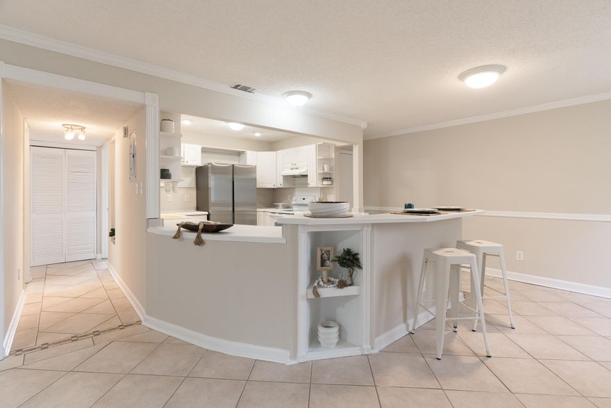 Beautifully Updated 2-Bedroom Condo with Resort-Style Amenities!This renovated 2-bedroom, 2-bath condo offers comfort, convenience, and coastal charm. The expanded kitchen features a spacious prep bar with generous counter space and multiple outlets--perfect for cooking or entertaining. Washer and dryer hookups are built in under the counter, ready for your own appliances.Ceiling fans in the kitchen, dining area, living room, and primary bedroom keep the space cool and breezy.Enjoy all the amenities of this waterfront community:Sound-front swimming pool, Lighted tennis court, Clubhouse with full kitchen, billiards, TV, and pool accessFishing dock and boat slips available on a first-come, first-serve basis through the HOA.Water, Trash, and Sewer included in HOA Dues.