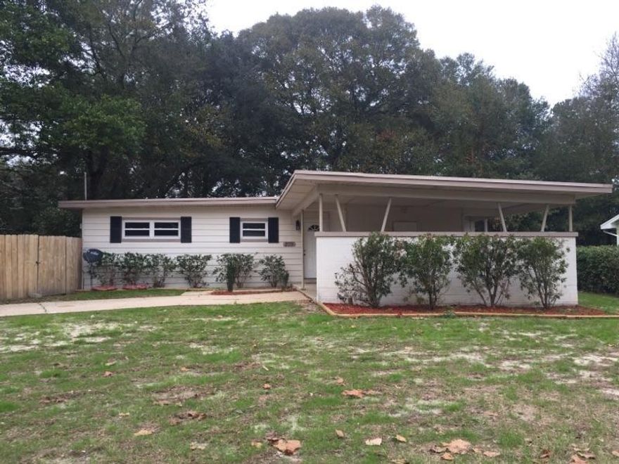 Wonderful home has been updated. Ceiling height raised in several rooms giving an open feeling. Freshly painted. Kitchen, dining and living rooms flow together. French doors open to the tile deck. Nice size backyard with privacy and chain link fence.