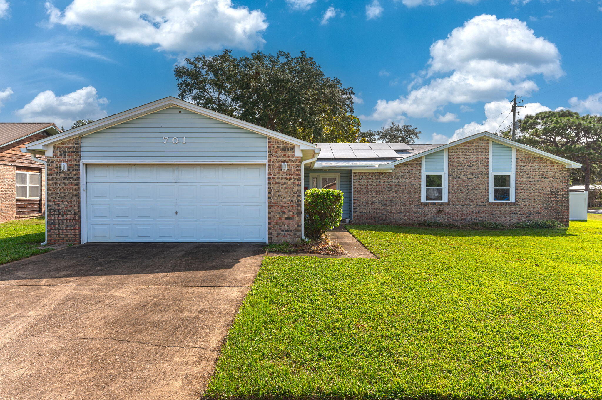 You must see this well-maintained 4-bedroom, 2-bathroom single-family home is a perfect blend of comfort and convenience. This home is in a desirable neighborhood, offering everything you've been searching for, sitting on a corner lot. This home has a spacious living room, updated kitchen appliances, a large private backyard, and an attached garage in a prime location close to schools, shopping, and entertainment. Highlights include a new roof (2022), paid off Solar Panels (2017), HVAC air handler (2018), tankless water heater (2018), 22k natural gas generator, tile floors throughout the home, and a natural gas fireplace. Take advantage of this fantastic opportunity to own a well-maintained home with all the major upgrades complete. Schedule a showing today!