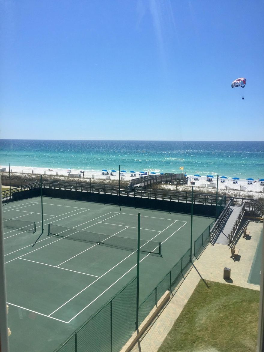 GULF FRONT, 5th Floor! This beautifully appointed 2 bedroom 2 bath condo is the one you've been searching for.Turn key unit is located on prestigious Holiday Isle. Holiday Surf and Racquet Club is a gated condo complex that is currently undergoing an exterior remodel and offers the best value on the beach. Community Pool, Tennis Court, Beach Boardwalk, Business center, Fitness center, and an endless supply of dolphins playing just off your private balcony. This unit features Wood plank tile flooring, Wood cabinetry w/granite counter tops and glass tile, stainless appliances, Dry Bar, gulf front master and a large second bedroom. New Exterior doors and windows on the gulf side. All furnishings convey! Seller is licensed real estate agent in KY.