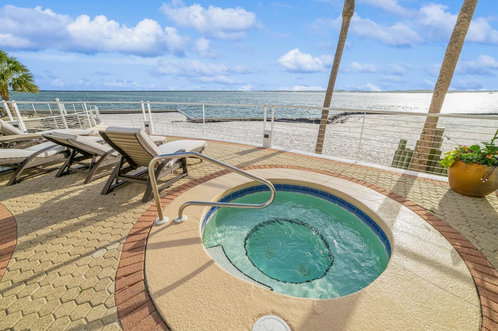 Discover the joy of coastal living in this stunning 3-bedroom, 2-bath luxury condo perched on the edge of Destin Harbor and East Pass. Spanning nearly 1,500 square feet, this waterfront sanctuary blends elegance with relaxationa"offering uninterrupted views of the water from multiple private terraces where sunrises and sunsets become daily rituals.From the moment you walk in, you're greeted by warm wood floors, mirrored accent walls that reflect the coastal light, and an open-concept layout designed for connection and comfort. The kitchen is both stylish and functionala"perfect for entertaining or enjoying quiet meals with harbor views.The waterfront primary suite is your personal escapea"complete with its own private balcony where the soothing sound of waves and breathtaking vis