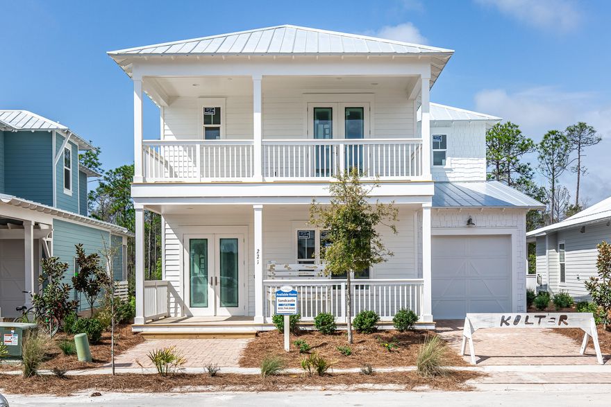 This is the last available new construction Sand Castle and it's under construction now! This floor plan has 3 master suites! This one has it all- coastal luxury, light finishes and beautiful pond views with room for outdoor living! Four porches make up over 700 square feet combined + just steps away from the longleaf trail in the Point Washington State Forest and short walk to the pool. 1st floor owner's suite with gorgeous free standing tub, rectangular white tiled floors and large walk in closet. White exterior with grey interior walls. Kitchen includes white shaker cabinets all the way to the ceiling (glass upper cabinets) and premium Quartz countertops, and glass tile backsplash. Kitchen also features built in GE Cafe appliances with gas cook top and GE Monogram chimney hood.