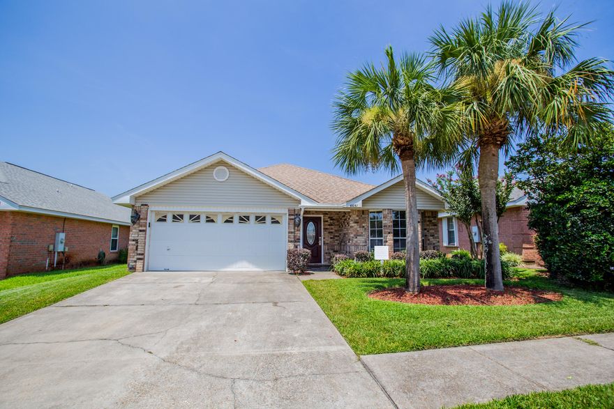 Walk to the beach from this beautiful home in the quiet Sunsail Subdivision South of Highway 98! Gorgeous kitchen with beautiful granite counter tops, updated cabinets, and stainless steel appliances. Living room flows nicely off the kitchen and has hardwood floors and a fireplace. The back patio with privacy fence faces north and provides respite from the sun most months.  Nicely landscaped front yard with a privacy fenced back yard. HOA is incredibly low and includes pool. Across from Destin Commons and Whole Foods with great shopping and restaurants in very family friendly neighborhood. Currently being used as a short-term vacation rental after the owner moved away, this home is perfect for either full time living or as an investment.