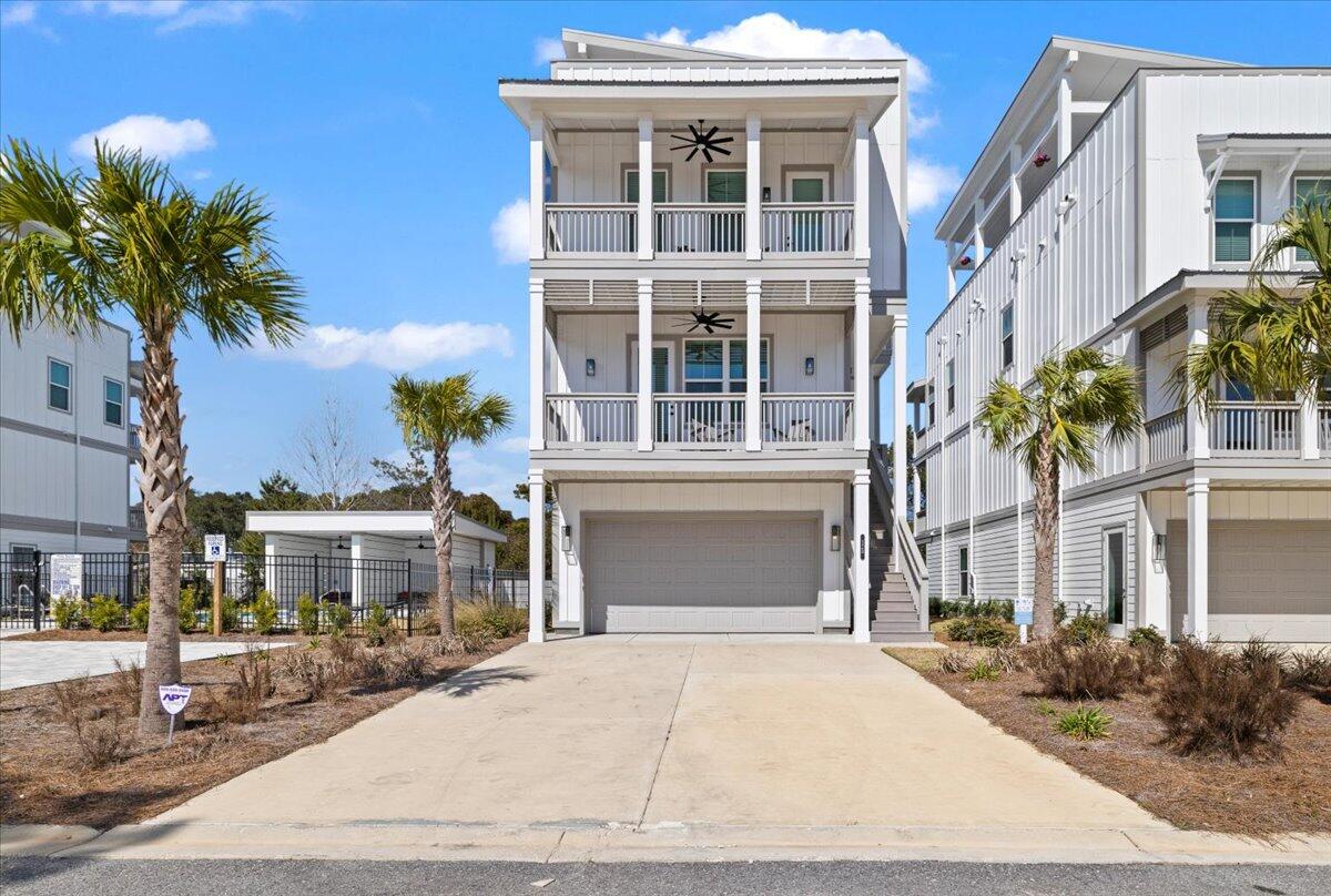 Better then NEW - ( almost new ) home comes fully furnished and turn key ready for your rental investment. Amazing 5 bedrooms and 4.5 Baths. Would be a great rental machine or an amazing 2nd home/full time residence. With a two car garage and roof top views of the gulf- 15 Queen Palm Dr. is awaiting you and your family. The open concept 1st floor offers a chefs kitchen with dinning and living rooms attached and open. Light flows through the high ceilings making the nearly 3K SQFT feel even larger. Truly a must see!! Call and make appointment today.