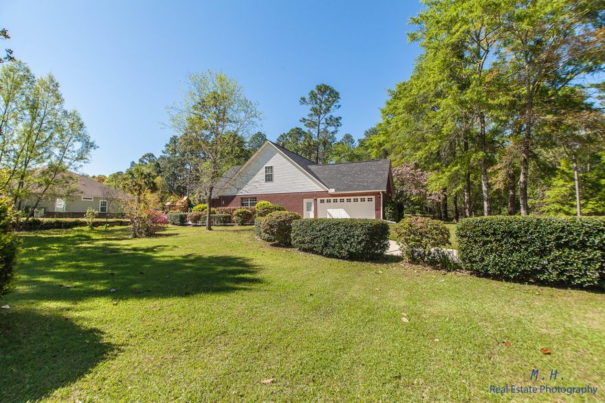 4 bedroom, 3 full bath home in South Crestview. Beautiful brick home on a large corner lot. Spacious and bright eat-in kitchen has direct access to screened porch. Sparkling saltwater pool. Master bedroom on the first floor with french doors that lead to the pool, a huge walk-in closet, spa-like master bath, dual vanities, separate dressing area, large soaker tub and walk-in shower. In addition, another first floor bedroom/office space, full size bath, large dining and living area, 17' ceilings, wood-burning fireplace. Upstairs, two bedrooms with custom built-in shelving and recessed lighting. Connected by a hollywood style bathroom with separate private vanities. New roof 2015, hot water heater 2015, and in 2012 a 13 SEER 4 Ton Heat Pump HVAC system installed. One year Home warranty.