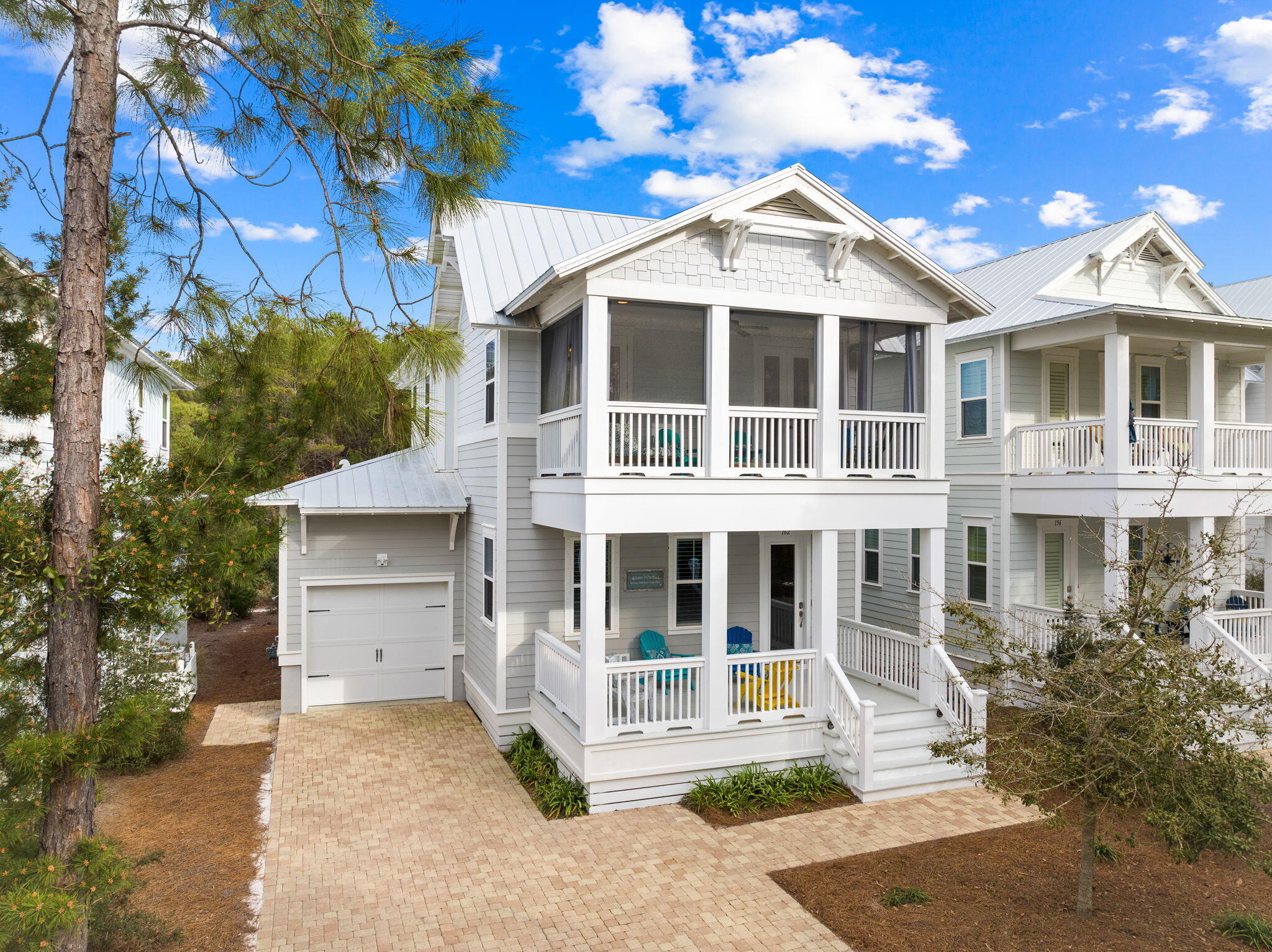 Nestled between Grayton and Topsail State Parks, this already private backyard blends seamlessly withthe 4 bedroom, 3.5-bathroom residence. This beautiful residence spans 2235 SF along with 500 SF ofcovered outside living (3 large porches, 2 screened), offering ample space and luxurious amenities for adiscerning buyer. A large open living and dining space surrounded by views of Point Washington forestprovides a peaceful escape to a day enjoyed at the resort style pool in the coveted Highland Parkscommunity on 30A. Adorned with 10' coffered ceilings, shiplap, and board and batten details this homeexudes an air of sophistication. The home boasts two master suites, one on the first-floor and one onthe second floor. A flex room on the first floor can serve as a 5th bedroom,