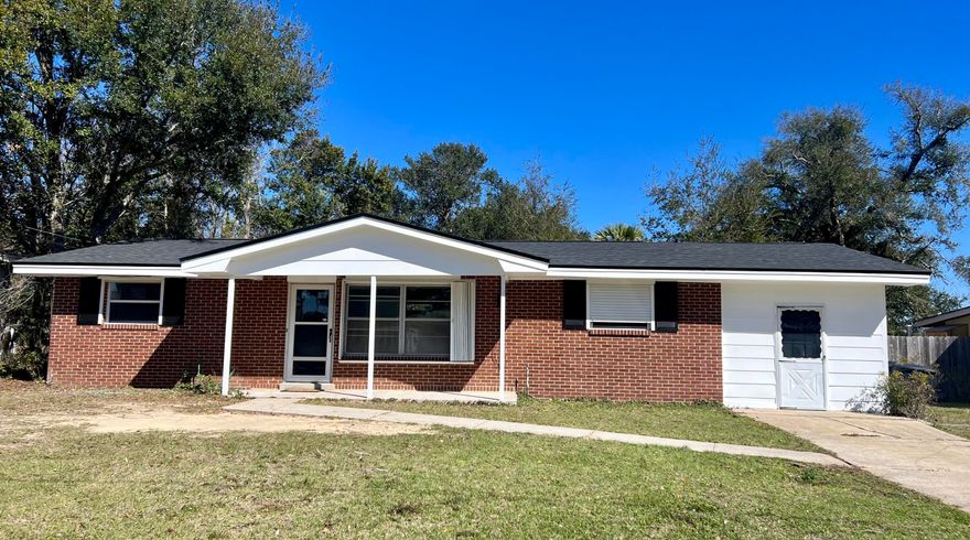 Cute brick starter home or potential investment property with wonderful recent updates!  If you're looking for a great deal; look no further! This home is located in Mallory Heights subdivision that is loaded with timeless charm of brick, ranch styled homes and offering a wonderful playground and park to enjoy with your loved ones. You are welcomed to this enchanting home by a decently sized lot that is shaded with mature trees and accented with quaint white shutters. Inside you are welcomed to a wide-open living space with new LVP flooring that flows wonderfully to the adjoining dining area and kitchen.  Adorable character is seen by the exposed brick wall that perfectly separates and compliments the living and dining area. This crafts a perfect setting for any intimate gathering. The kitchen features plenty of counter space, black cabinetry, and easy to care for laminate countertops. Hosting and extended guests will be made a breeze, with its ideal split floorplan as well as all NEW carpeting in the living room and a bedroom. To the right of home, you will find the owners suite that features chic parquet flooring amidst the spacious room, ceiling fan, and abundant closet space. To complete the master, is an adjoining full ensuite that consists of a convenient walk-in shower and single tidy vanity. The other two guest rooms can be found opposite the home and are both reasonably sized and share a neighboring full bath between, with a shower/bath combo. Wonderful large screened-in porch off the back of home that makes a great addition for sitting in your comfy patio furniture, guarded from all the elements. You'll find access off the screened porch to a generously sized utility, laundry room, or additional storage area. Recently cleared, private backyard and serves as a blank canvas for all your landscaping ideas! This home is centrally located to everything in Pensacola including beautiful white sandy beaches and the bay, Colleges, shopping, eateries, and entertainment. This home has a lot of life left and waiting for you to make it a HOME! NEW ROOF! NEW HVAC! NEW GAS WATER HEATER! NEW FLOORING! NEW PAINT INSIDE AND OUT! ALL NEW JUST FOR YOU! Make this one yours, before it is gone. Call today for a private showing.
