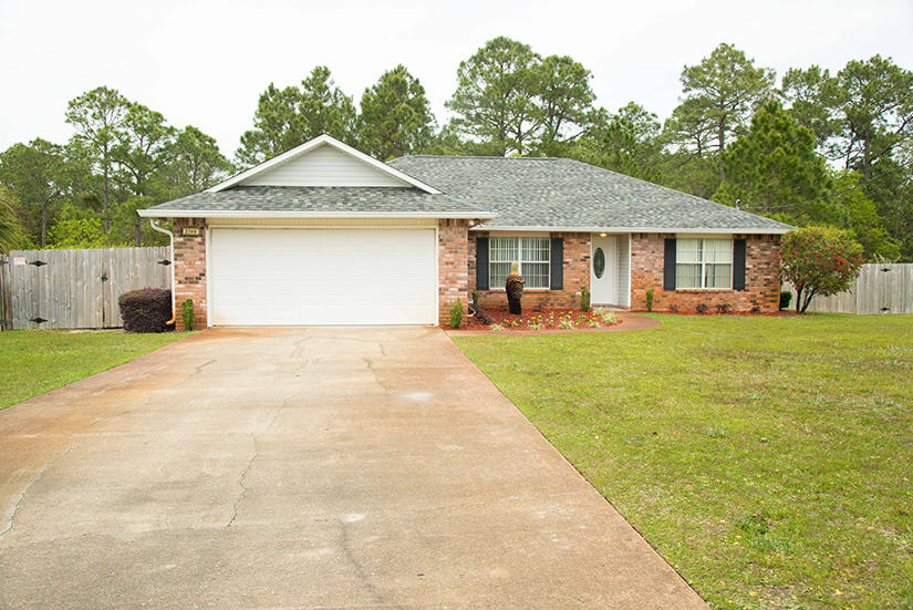 Brand new Dimensional Roof! Located 7.5 miles from Hurlburt Field AF Base and minutes away from beaches, shopping, eateries and schools. Features include a spacious great room with wood fireplace and high plant ledges, formal dining room, gourmet kitchen with stainless steel appliances, island, tile flooring, split floor plan, master bath with double sinks and garden tub, new carpet in master bedroom and a large, fenced back yard.