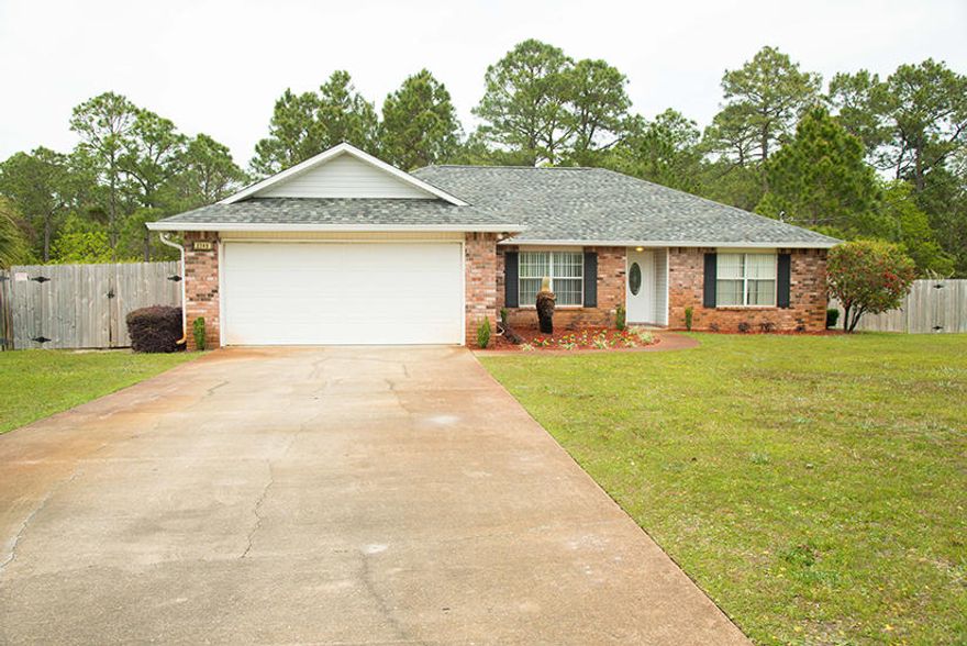 Brand new Dimensional Roof! Located 7.5 miles from Hurlburt Field AF Base and minutes away from beaches, shopping, eateries and schools. Features include a spacious great room with wood fireplace and high plant ledges, formal dining room, gourmet kitchen with stainless steel appliances, island, tile flooring, split floor plan, master bath with double sinks and garden tub, new carpet in master bedroom and a large, fenced back yard.