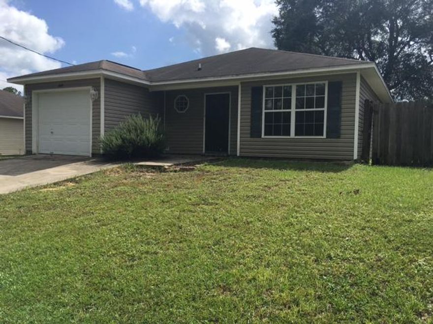 Perfect home for the first time home buyer or the investor. Located south of I10 and the hustle and bustle of Crestview. Has a great fenced in yard in a smaller community. Split floor plan allows for privacy for the adults and kids or great for the roommates. The open floor plan compliments todays living style and enables everyone to be together for the great times and entertainment. The home has a large back/side yard that is fenced to allow for the pets and children to play. The single car garage, just off the laundry room, is drywall finished and has the electrical panel for the generator should the underground utilities fail for some reason. Note the washer and dryer do convey but as-is of course.