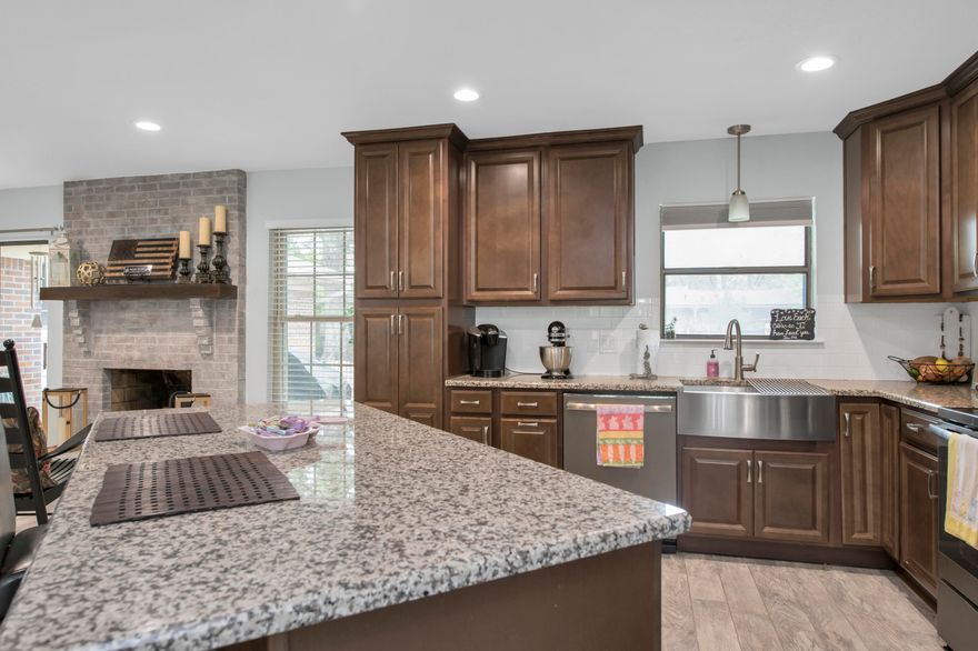 New to the Fort Walton marketplace is this remodeled home from top to bottom. Upon entry, you'll find a brand new kitchen with slate appliances, a large granite center island, and updated stainless seamless sink. Furthermore, enjoy completely updated bathrooms with a walk in tile shower in the master bath. Porcelain tile through main areas with new carpet in the bedrooms. This house is just minutes from everything centralized. Located close to both Eglin and Hurlburt Air Force base. Just three miles to downtown and the beautiful beaches.