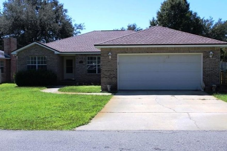 Short Sale. Brick 3 bedroom, 2 bath home central to anywhere you will need to go in Niceville. Home has nice open floor plan with lots of natural lighting. Spacious master bedroom, master bath has a dual vanity and garden tub. Nice sized walk-in closet. Screened-in porch with a large back yard. Yard building conveys but as-is.