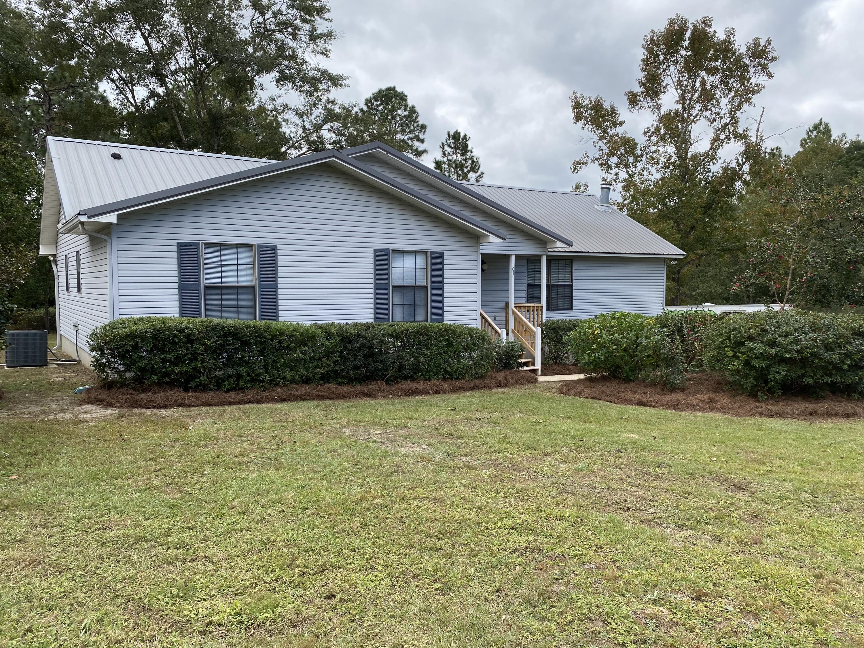 Includes lawn care. This home, located on the 9th green of the golf course, has a lot of space. The kitchen includes all the appliances. There is a dining room, large living room, sun room, laundry room, and detached garage along with 3 bedrooms. Outside is a large garage/ workshop for tenants use.
