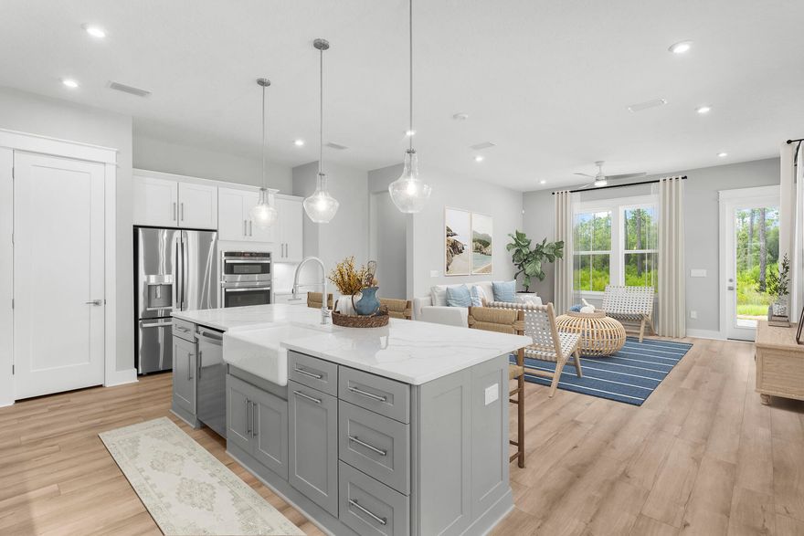 Entered for comp purposes. Welcome to The Villas at Longleaf Park in the Watersound Origins community, offering stylish paired/attached villas by Fischer Homes. This newly finished  LUCAS plan is a beautifully designed 2-bedroom, 2-bathroom single-level home, featuring 1,418 sq. ft. of effortless living space and a 1.5-car garage.Step inside to an inviting open-concept layout with a modern kitchen, spacious dining area, and a bright living room that seamlessly flows into a private covered patio, perfect for outdoor relaxation. The primary suite overlooks the backyard and boasts a spa-like ensuite bathroom with a double vanity and a generous walk-in closet.This home includes standout features like luxury vinyl plank flooring throughout, 10 ft ceilings, and more.