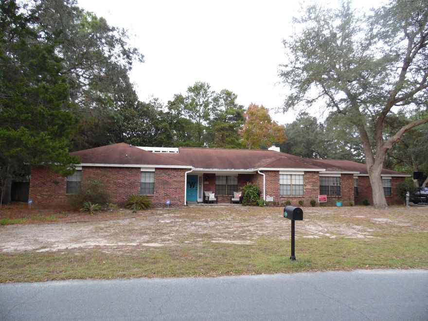 CHARM, CHARM, CHARM! As soon as you enter the door, you immediately feel at home. The brick, wood burning fireplace warms the living room! The laminate flooring throughout the whole home (no carpet) is in great condition (installed in 2014). The updated kitchen with newer appliances opens to the breakfast nook and leads to the dining room on one end and the Florida room on the other. The Florida room leads out to a covered porch and a very spacious backyard and courtyard! The courtyard is accessible from the backyard but also from the master bedroom! Both guest rooms feature large closets and new ceiling fans. When you walk into the master bedroom you will be pleasantly surprised! The bedroom has 2 walk in closets, entry to the courtyard, an updated master bath with a walk in shower and
