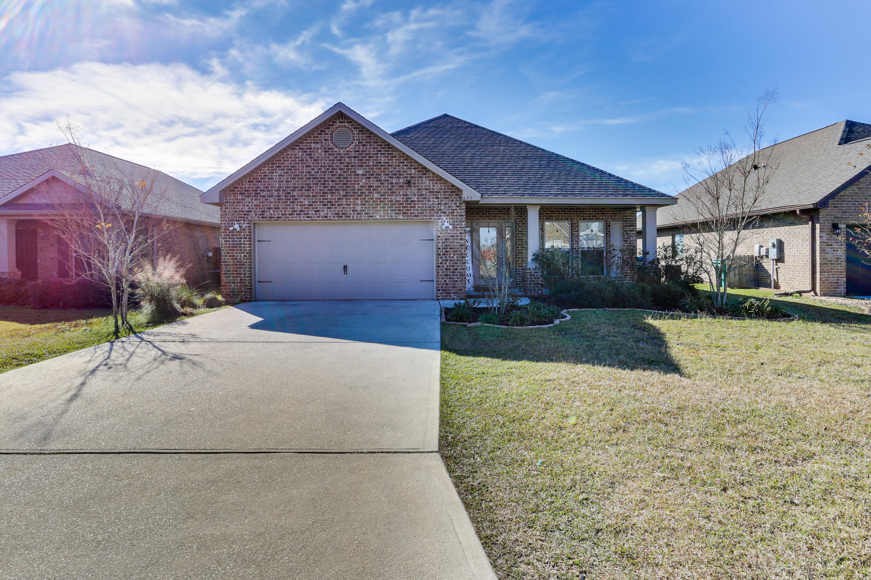 Impeccable one-story home in desirable South Crestview, across the street from great schools! Redstone Commons is a safe neighborhood with amenities like a playground, pool with a covered pavilion, a dog park. Close to military bases. Beautiful home featuring 3 large bedrooms, 2 bathrooms, a bonus room, covered front/back porches & 2 car garage. The open kitchen features an island, stainless steel appliances and granite countertops. The kitchen opens to the great room w/ access to the back covered porch. The master bedroom is just off the back side of the house & master bathroom features a large walk-in closet, separate 5' tile shower, dual sinks & large tub. The bonus room can be used as a home office/4th bedroom. It has a large fenced in back yard and a community pool. Make an appt today
