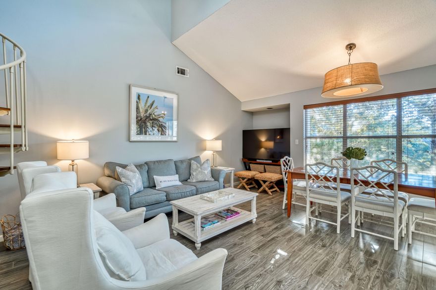 Discover this charming 3-bed, 3-bath beach cottage nestled in Hidden Dunes Resort. Step into the inviting living room and kitchen with vaulted ceilings, bathing the space in natural light. An oversized screened porch awaits, perfect for enjoying summer evenings. The master bedroom offers a king-size bed, walk-in closet, and a spacious private bath. The second bedroom features a queen bed and en-suite bathroom. Upstairs, a loft with two full beds and its own bath overlooks the living room.Hidden Dunes Resort caters to all family members with Community pools, private beach access, manicured walking trails and tennis courts, Just minutes away, Silver Sands Outlet mall, top-notch dining, and nightlife await. Championship golf courses also nearby, ensuring there's something for everyone,