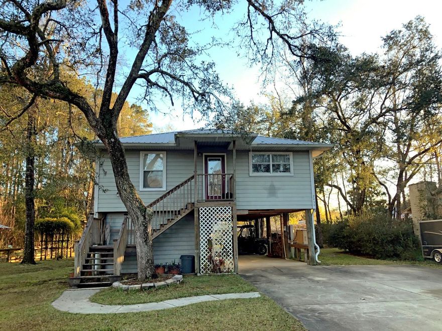 Want to live someplace with river access, your own covered dock with lift and nature at its best? Check out this home with 75 ft of canal frontage leading to the Choctawhatchee River and a short boat ride to the bay. Home has two bedrooms, a bonus room, enclosed porch overlooking the canal, elevator lift, whole house generator, screen room with summer kitchen under the house and lots more. There are two baths upstairs and a full bath down. Covered dock has a lift and fish cleaning area. Deck lines the length of the canal for those quiet evenings or morning coffee. Home is fully furnished and ready for you to move in. Call for your appointment to tour this great home today. All information and measurements are approximate and should be confirmed by buyer if important.