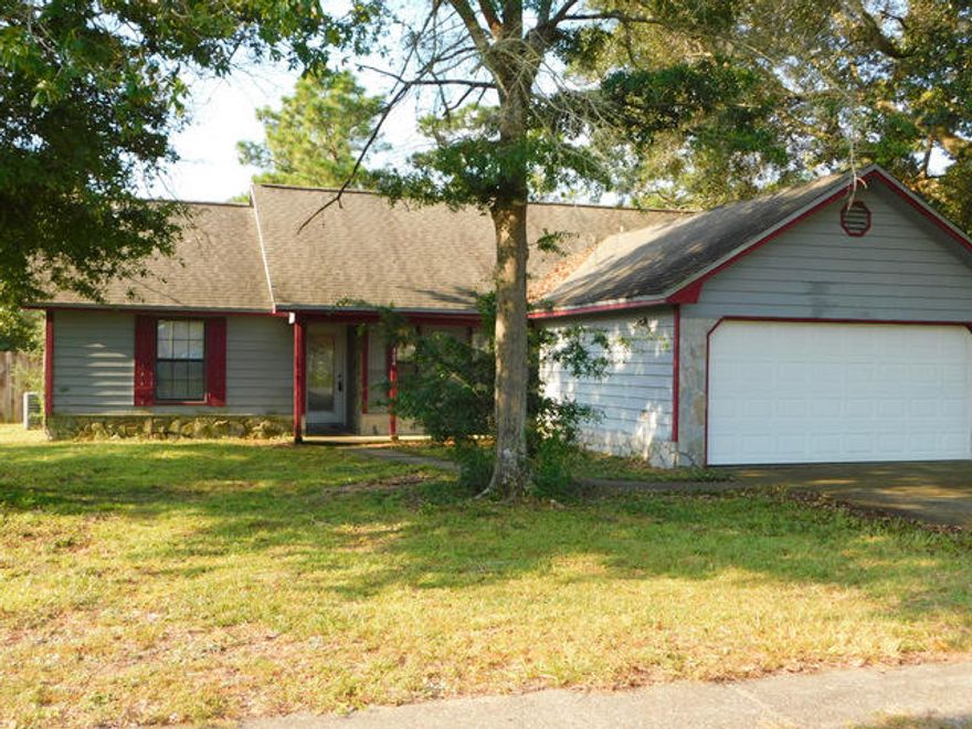 Enjoy lower county property taxes in this south side home. This location allows you to avoid any rush hour traffic after work by taking the first exit in Crestview when coming form the south. The home offers a split bedroom floor plan and the Rustic feel.Ready for immediate possession, this would make for a great starter, retirement or investment property. Located on nearly 1/2 acre and there is additional land available in the rear of the property for $1,500. ( separate transaction) This will allow for rear access for your boats/RV's/ etc. Come and take a look at this great home at a great price.