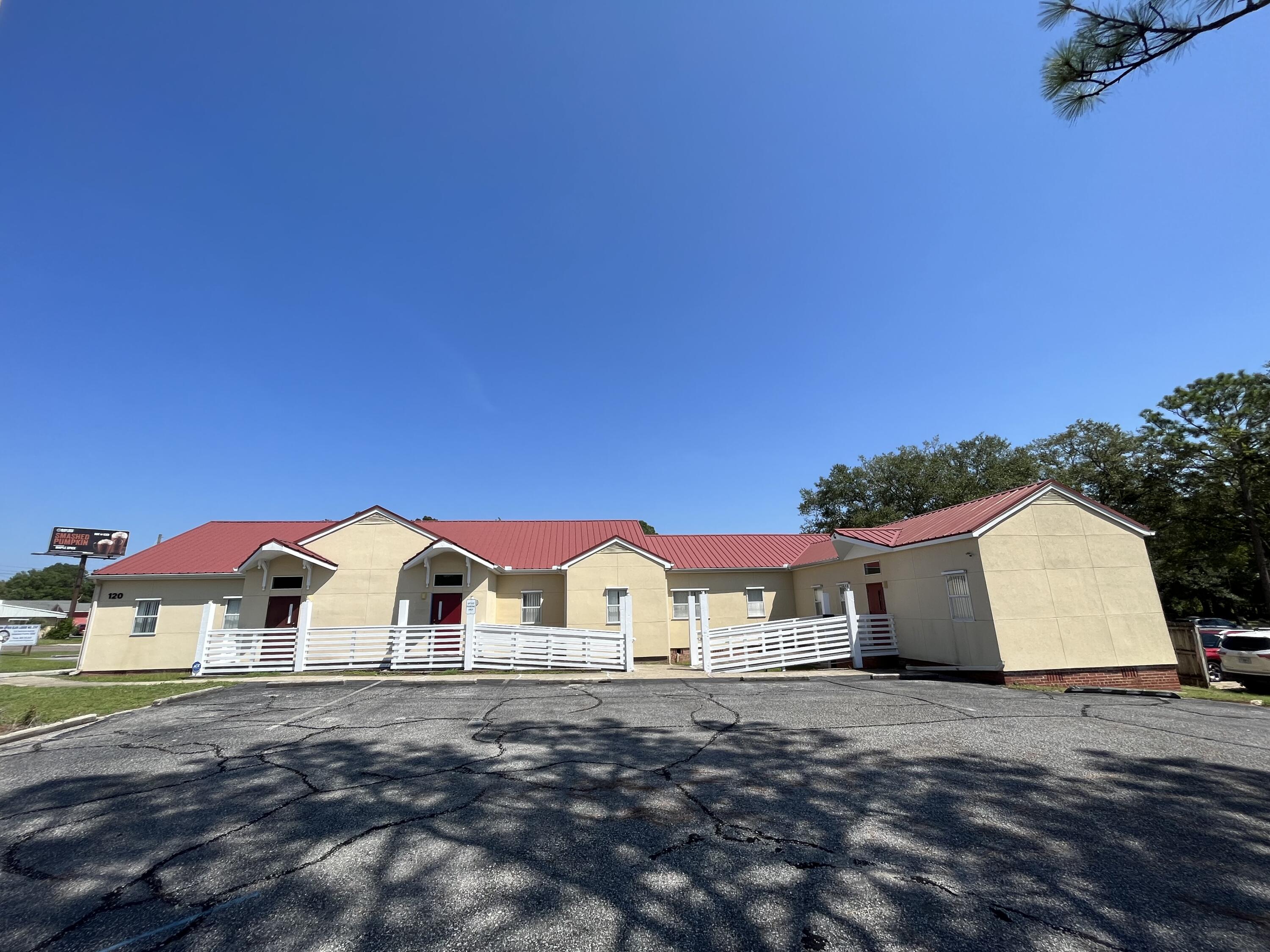 Medical / Office Building located just outside the east gate of Eglin AFB in Valparaiso, FL. This single story, 4546 SF building is current designed to accommodate 3 different tenants. It has been home to medical professional in the past and has extra plumbing throughout. This office building has 18 parking spaces with access in front as well as behind. This parcel is located on the corner of John Sims Parkway and Seminole Avenue.