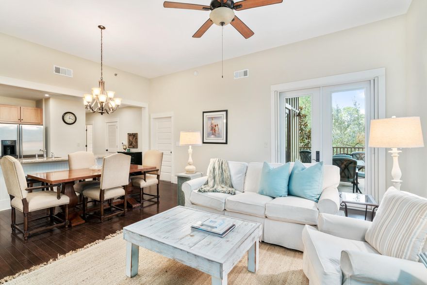 Overlooking Big Redfish Lake, a protected coastal dune lake, from your secluded corner covered balcony at Redfish Village you will enjoy all there is from Redfish Village Condominiums. This, not on a rental program, 3 Bedroom condo, offered furnished, features tasteful wood cabinetry, granite counter-tops, wood floors, stainless steel appliances with wine refrigerator, over sized master shower, custom owners closet and built in screens on the Master and the Living room porch doors. The owners take full advantage of owning a private deeded beach gateway to the white sand beaches of the Gulf of Mexico with private bathrooms & outdoor showers that are accessible by the Redfish Private Beach Tram, a short stroll or bike ride. Chairs and umbrella rental services are