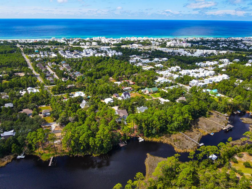 Don't miss this rare opportunity to own a fenced .37 acre lot on the beautiful shores of Lake Powell. This vacant lakefront property comes complete with a private dock and boat lift--perfect for boating, fishing, and enjoying the natural beauty of Florida's largest coastal dune lake. Buyer to verify any and all information deemed important to them.