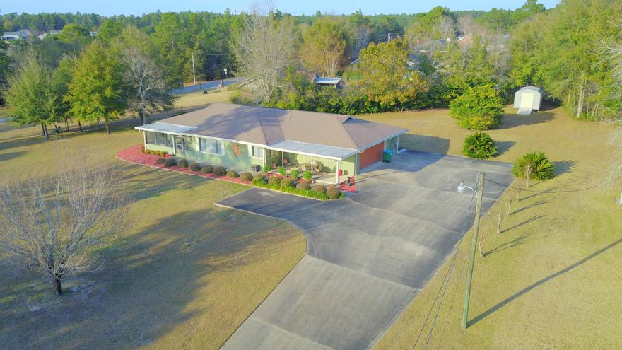 REDUCED!! Check out the video & imagine yourself sitting in the elegant Dining Room relaxing over morning coffee or afternoon tea overlooking a stunningly beautiful vision of the sun setting on the water & the absolutely gorgeous views of Kennedy Lakes! Don't let this immaculate home pass you by & if your looking for more bedrooms there are tons of possibilities. This homes flows beautifully from room to room giving a very open and roomy feel to it. Upgrades include beautiful hardwood floors as well as a brand new 2017 roof. AC & Septic System were replaced in 2007. New hot water heaters (oversized in the master bath) were replaced 5 years ago & a Deep Water Well Pump added 4 years ago plus new 10x12 shed. Also, can hook your RV up on the oversized driveway.