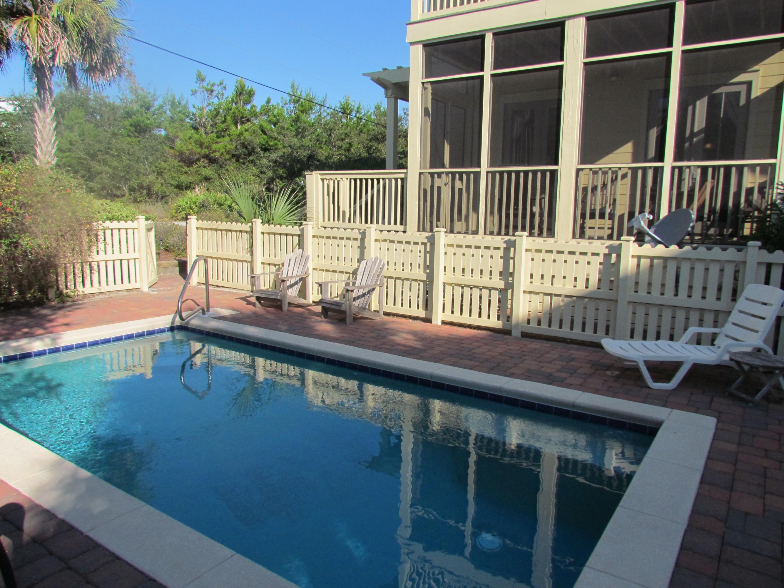 20 Brown Street - a family beach retreat where memories are made! Sold fully furnished and rental ready with 5 bedrooms, 5 baths, and a gorgeous pool... this house is just steps from the sand and checks all the boxes. First floor includes the kitchen, dining and sitting area as well as a downstairs bedroom. The second floor has three full bedrooms and baths, including the master bedroom with access to a peaceful, private deck perfect for quiet morning coffee. The third floor is host to a wet bar and large sitting area as well as a bedroom and bath, all that open onto the third floor porch with its Gulf views. Rental projection is over $92,000!