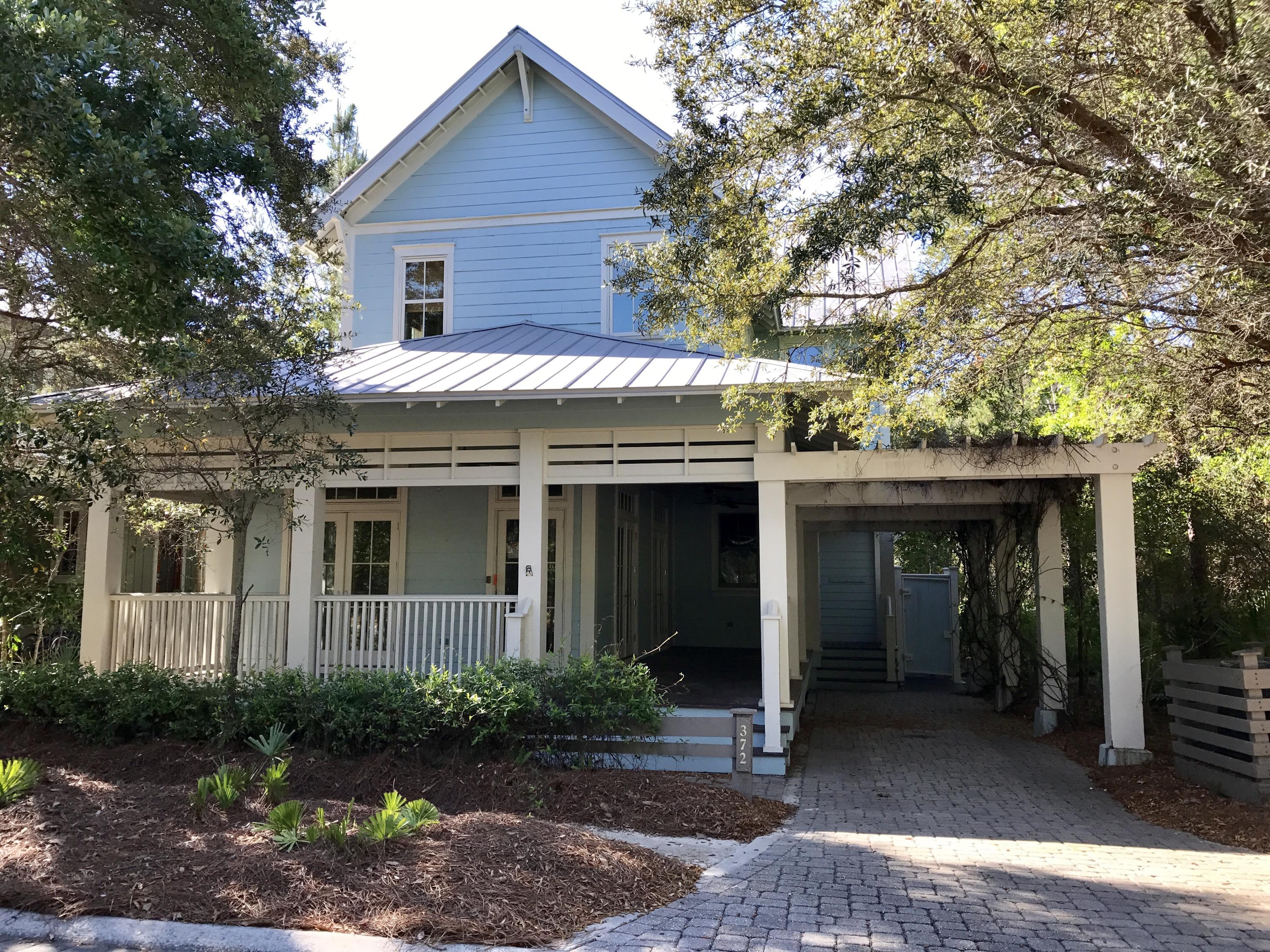 REO ~ Tucked away on a quiet street in WaterColor's Pine Ridge District, you'll find this charming 4 bedroom, 4.5 bath home. The Florida Cottage offers an open floor plan with spacious kitchen with plenty of cabinet space, large island & granite counter tops. The den & dining room are open for entertaining. The fireplace adds plenty ambiance to the room. The master bedroom opens to a porch to enjoy morning coffee. The main areas along with the bedrooms offers pine wood floors. The cottage also offers a covered front porch perfect for enjoying neighbors & the park across the street. The location is also convenient to the Town Center & all the happenings of 30A.