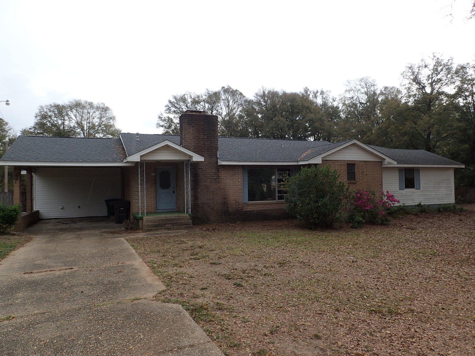 Built in 1956, this Fannie Mae HomePath REO home is large, rests on a large lot, and has tons of potential. At just over 2100 square feet, this home has 3 bedrooms and 3 baths. On a .9 acre lot, which is large for this neighborhood, this home has brick siding, fenced backyard with detached storage and a covered carport. Inside, this home has a large open living room with fireplace, separate dining and breakfast nooks just off the kitchen and indoor laundry. Three very large bedrooms and three baths take up the remaining square footage of this home. A must see to appreciate.
