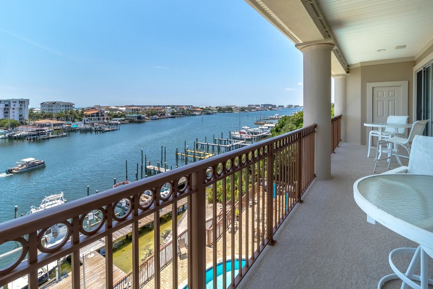 Harbor front condo with a DEEP WATER BOAT SLIP! Boat slip #F is located on the far east end. Take in the spectacular, panoramic views of the beautiful Destin Harbor from this penthouse level condo home with a large private balcony. The interior offers warm limestone tile, carpet in living & beds, crown molding, built in desk/shelving in guest bed, spacious kitchen with a long breakfast bar open to the living area and an island with separate sink, and a large master suite with private balcony access. There are only 6 condos in Harbor Plantation. Owners will enjoy 2 assigned parking spaces, a refreshing pool directly on the harbor and a private workout facility. Entire building exterior repainted this year 2018 & in 2014 to 2015, the pool was resurfaced.