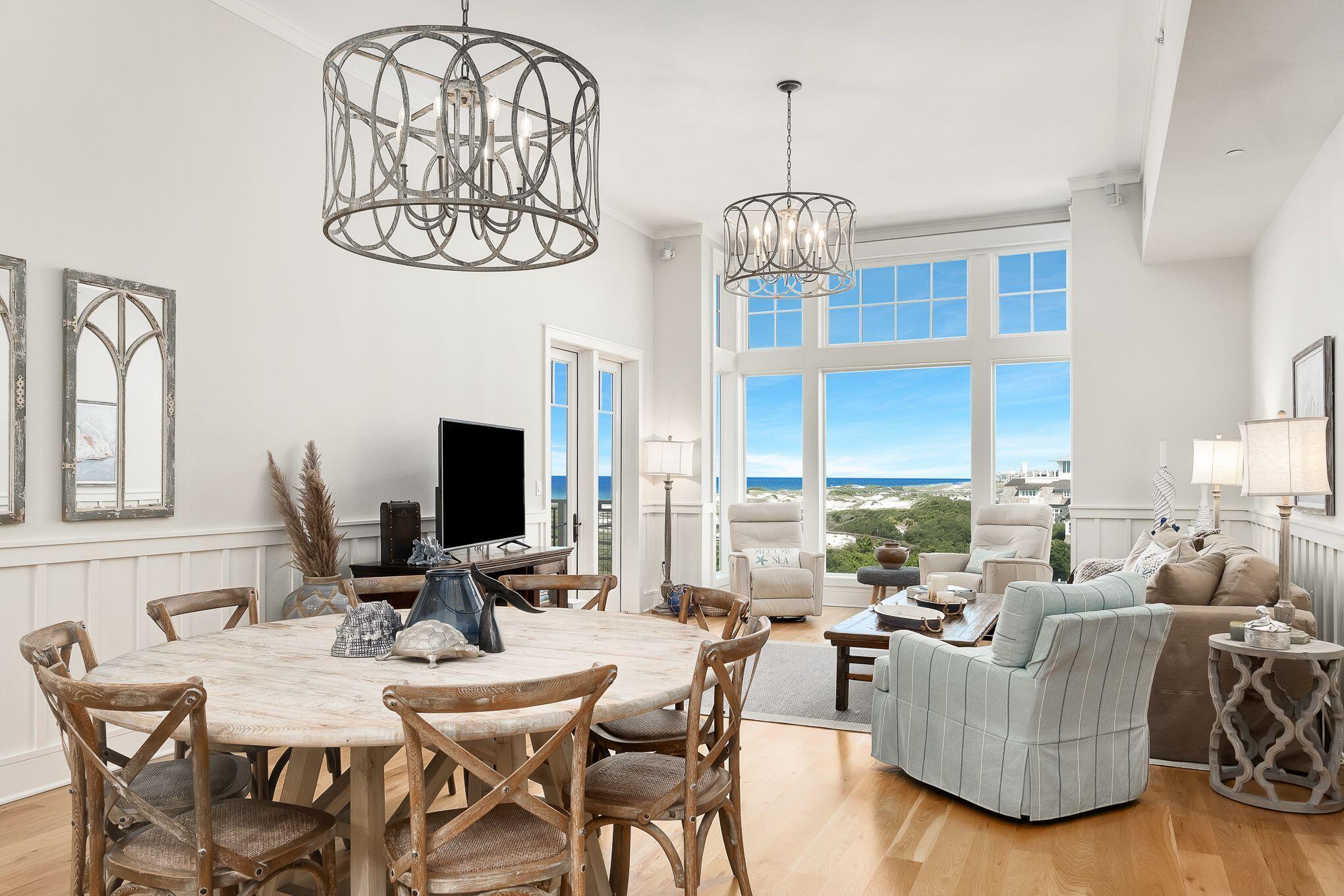 The most desirable top floor 2 bedroom unit in WaterSound Beach. Spectacular Gulf and Beach views. Watch the water break on the beach and see the most amazing sunsets over the dunes. The view alone will sell this condo. Two west facing decks and floor to ceiling Living Room windows make for some of the most amazing views on 30A. This top floor unit is also one of the few with raised ceiling height. The unit features upgraded wood flooring throughout, new HVAC and new Refrigerator. Sold FULLY Furnished with a few exceptions, NEVER RENTED, shows like new. This is a one of a kind property and must be seen to be fully appreciated. This unit also features the best garage space in the building just off of the elevator and with a large storage area. Also comes with golf cart parking