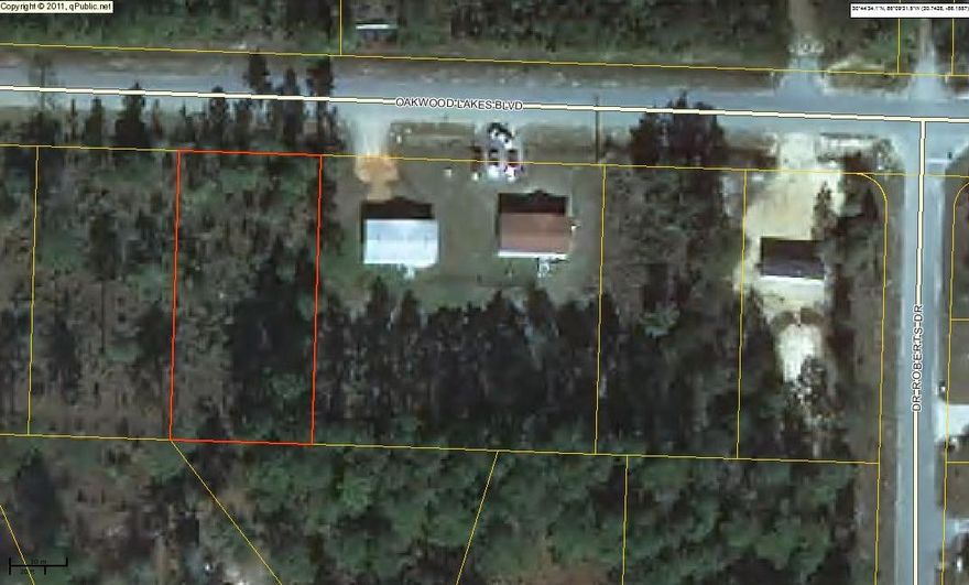 One of 4 consecutive lots on desirable Oakwood Lakes Blvd. These lots are located on a paved road just outside city limits. Tap fee and impact fee have already been paid. Power on road; will require septic tank. Make an offer on one or on all four!