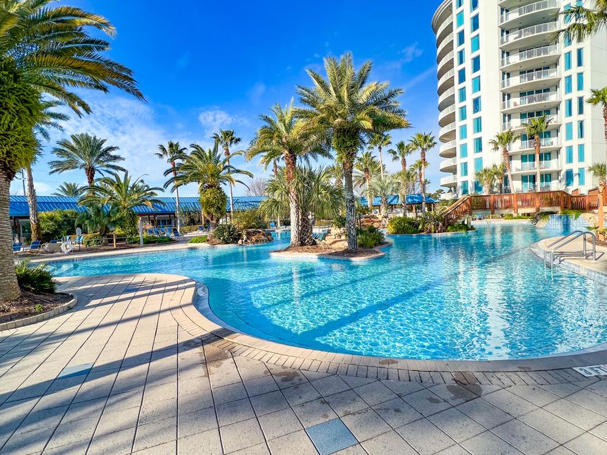 Poolside Villas at The Palms don't go up for sale very often. Villa 10 features a full 2 bed, 2 bath floor plan that has been fully updated with new LVP flooring. Comes fully furnished with updated furniture and beach decor. No elevators to worry about.... walk straight out of your door onto the pool deck. The Palms boasts a massive lagoon pool, hot tub, tennis courts, playground, fitness center, shuttle service to the beach, onsite coffee bar, restaurant and bar.The villas have 60k+ rental projections!!