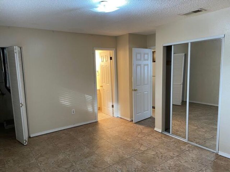 Conveniently located a stone's throw from the college as well as bases, schools, restaurants, shopping, the beach, and a medical center, this 1 bedroom 1 bath condo features neutral paint and tile throughout (no carpet), a full kitchen with dining area, and a spacious living room. Rent includes water, garbage, pool care, and lawn care, and there are laundry facilities on site. Cats may be considered with prior owner approval and a non-refundable pet fee. No smoking allowed, including vapes. Photos are from a comparable unit.