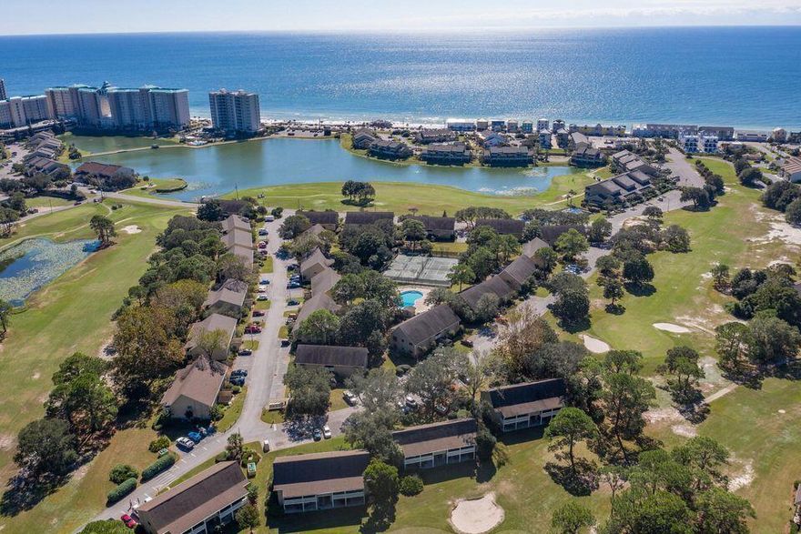 Welcome home! This is where Vintage Farmhouse Meets the Beach! This spacious and stunning beach condo features both modern amenities and architectural character in a fantastic, gated community w/ 2,000 ft of PRIVATE BEACH! This gorgeous 2 bedroom condo leaves NOTHING to be desired! You'll fall in love with the bamboo flooring. The custom designed kitchen boasts 'storybook' Martha Stewart white cabinetry, pantry, deluxe size farmhouse style kitchen sink and immaculate butcher block countertops. Sold Fully furnished- complete with upscale designer decor and handpicked top tier furnishings. Seascape Resort is the most amazing family destination with amenities that include 8 tennis courts, an 18-hole golf course, Cabana Cafe Restaurant, bike rentals, beach service+ more.