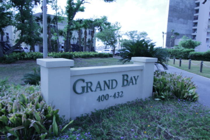 Waterfront Grand Bay Town Home located directly on St. Andrews Bay. Beautiful views of Bay, Shell Island, Redfish Point and Panama City Marina. Beautifully landscaped grounds with just a short walk to two marina's and downtown Panama City. Tri-level home with two bedrooms and 2.5 baths, feature 2160 square feet under roof, double car garages with openings on both ends for Bayside activities.... call to see today!