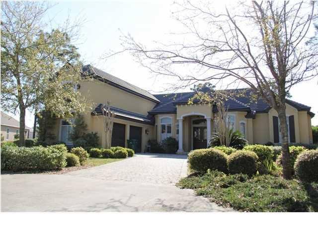 Come see this beautiful LAKEFRONT 4 bedroom 3.5 bath plus bonus room home located in the desired subdivision of Kelly Plantation. Newly Painted Living Room, Family Room, Laundry Room, Kitchen, Foyer and Two Bedrooms. You will immediately notice the custom designs and unique finishes. The entrance opens into a formal sitting area where you can enjoy evenings in front of the GAS FIREPLACE. This open floor plan has a formal dining room and open office area with a custom built in shelf. The home overlooks a LAKE and the award winning Kelly Plantation GOLF COURSE 6th hole. The kitchen has GRANITE, all GE Profile appliances, with the exception of the BOSCH dishwasher. The kitchen overlooks a breakfast nook and sitting area, with custom wall arches and hanging wrought iron gates.
