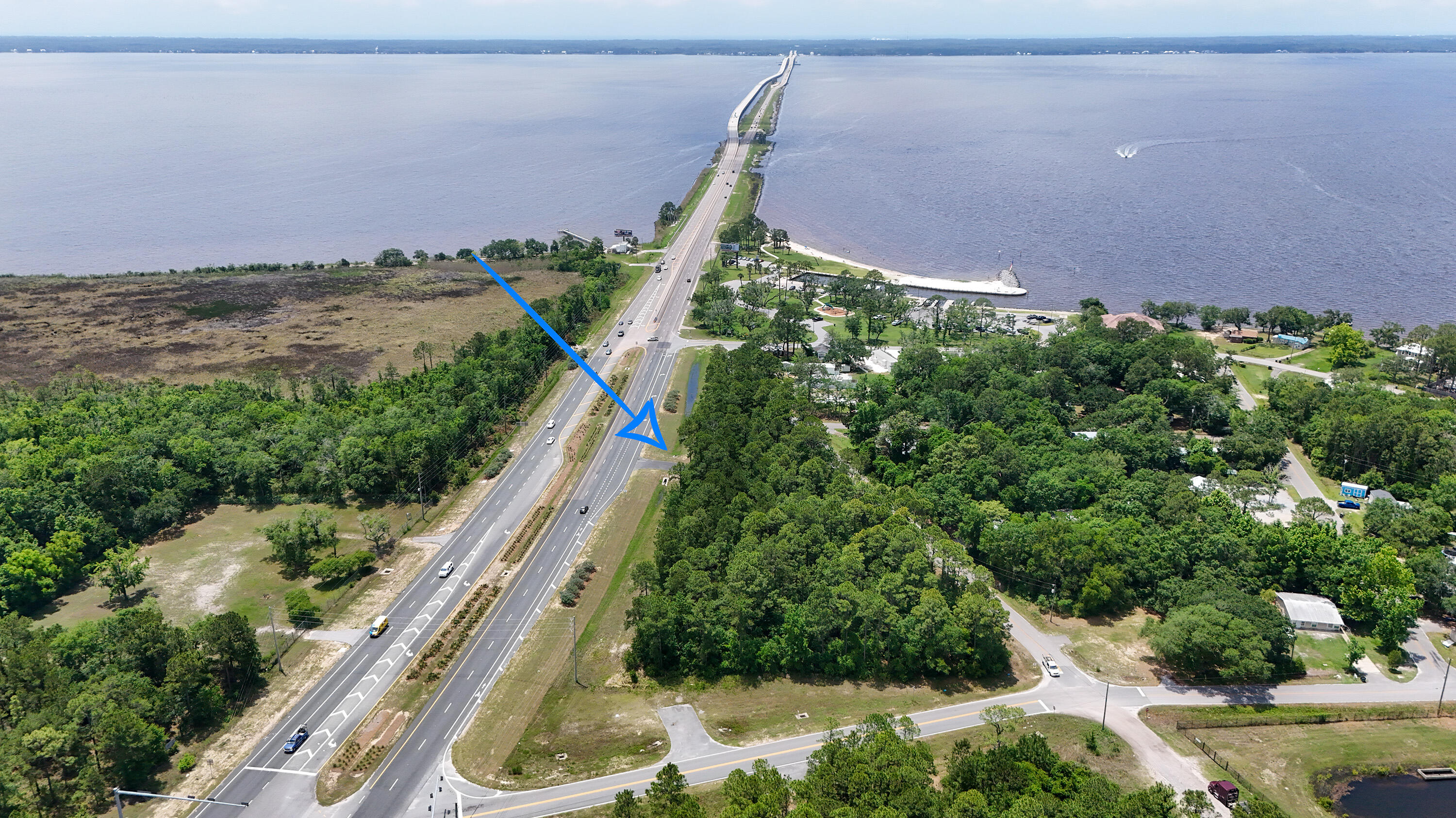 'Gateway to South Walton'. This 2.22 acres has 650 feet of frontage on Hwy 331 and is located just before crossing the Clyde Wells Bridge going to South Walton. Located on the West side of Hwy 331S, it is just steps from Walton County Grady Brown Park. This parcel has a zoning designation of ''General Commercial'', and lies in Flood Zone ''X'' & AE-7. Property currently has a paved drive off Short Ave. & also a paved drive off Hwy 331S. No Wetlands or Wetland Characteristics are evident within the site boundaries. The entire 2.2 acres have a paved road on all sides.