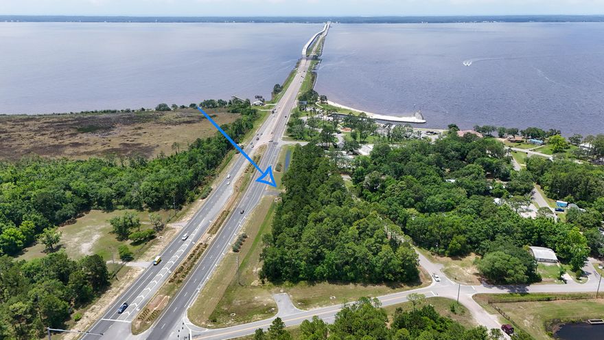 'Gateway to South Walton'.  This 2.22 acres has 650 feet of frontage on Hwy 331 and is located just before crossing the Clyde Wells Bridge going to South Walton. Located on the West side of Hwy 331S, it is just steps from Walton County Grady Brown Park.  This parcel has a zoning designation of ''General Commercial'', and lies in Flood Zone ''X'' & AE-7.  Property currently has a paved drive off Short Ave. & also a paved drive off Hwy 331S.  No Wetlands or Wetland Characteristics are evident within the site boundaries.  The entire 2.2 acres have a paved road on all sides.