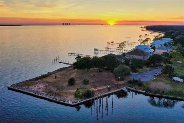 Welcome to The Sanctuary - your exclusive waterfront haven! Nestled just off Soundside Drive in Gulf Breeze, this extraordinary residential lot spans three-quarters of an acre of pristine waterfront. With over 200 feet on the Sound and ample protected canal frontage, it's truly a boater's paradise. The property is fully cleared and ready to build the forever home you've always envisioned - a stunning coastal retreat with breathtaking views. Don't miss this unique opportunity to embrace and own the ultimate waterfront lifestyle with endless possibilites.