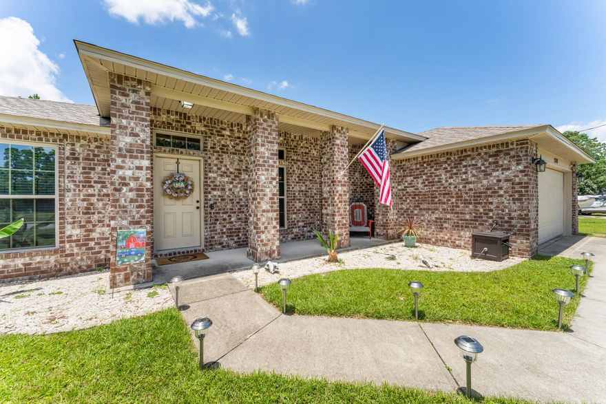 BEAUTIFUL BRICK HOME IN NAVARRE!! Step inside to discover beautiful luxury vinyl flooring throughout the home. As you make your way past the bonus office or living space and formal dining area, you'll feel the space open onto the main living and kitchen. The main living area features high ceilings and french doors leading to the backyard. The kitchen offers an abundance of cabinet space, recessed lighting, granite countertops, kitchen island and stainless steel appliances. The master bedroom has an abundance of space and is framed by a window to allow plenty of natural light. The private master ensuite features a garden tub and double vanity. The additional 3 bedrooms and two bathrooms offer space for the whole family. Outside in the fenced backyard you could spend your days enjoying the.. abundance of space, pool and deck. This property offers space for boats and RVs. Don't miss this gem! Schedule your showing today and let us welcome you home!!