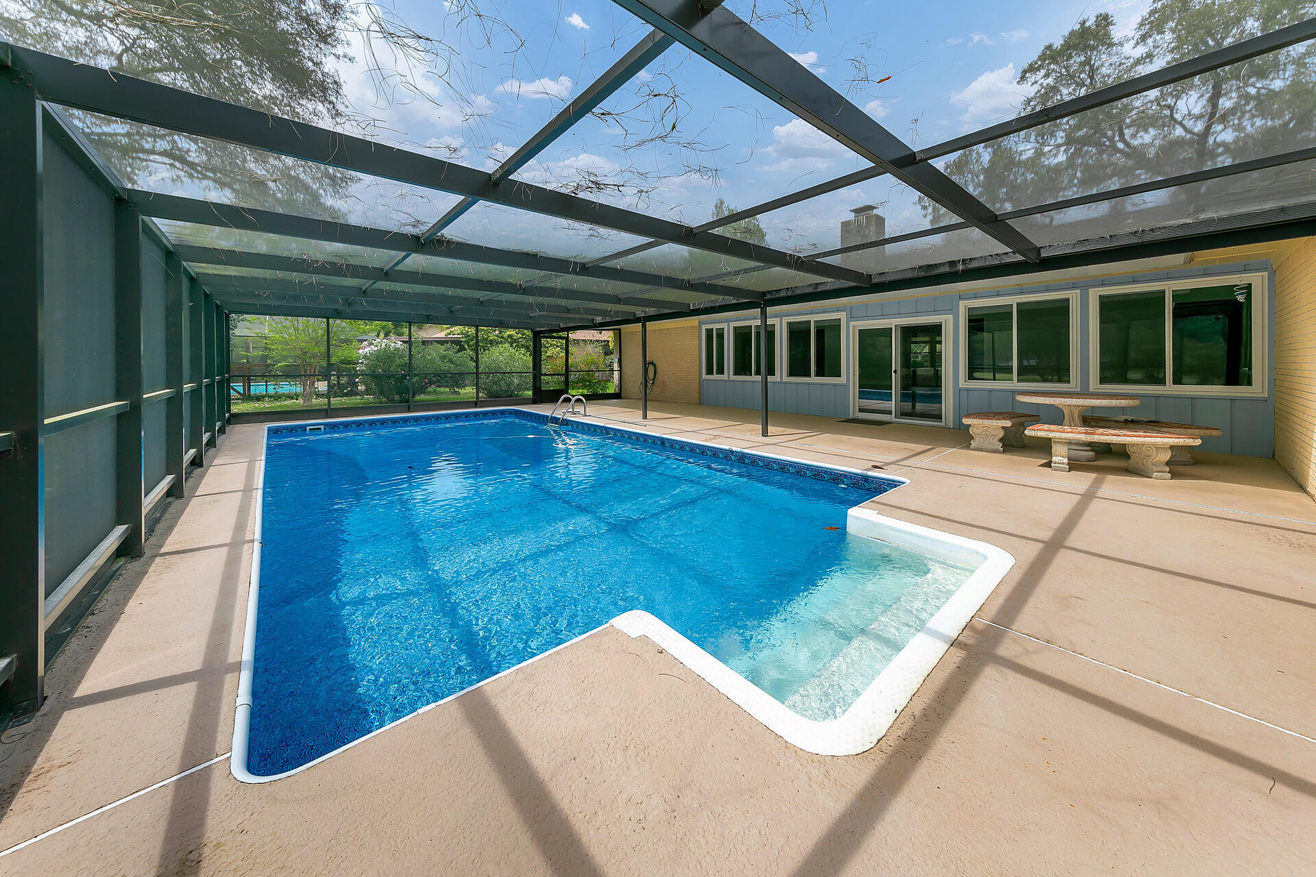 This lovely home is ready for you to move right in. Screened in pool with great outdoor space. Located on Sharon Drive so there is no through traffic making this a quiet neighborhood. The Florida room is enclosed for year round enjoyment. Gas fire place. The 2 car garage was recently painted, the floor was redone, and there is even a new door to the attic. The roof was redone in February of 2021 and storm windows were installed May of 2023. Updated flooring. Stainless appliances and quartz counters in the kitchen. Tankless water heater. Plenty of shopping and entertainment options within a mile or 2. This property is adjacent to the Rocky Bayou Country Club golf course. Room sizes are estimated, buyer to verify all information.