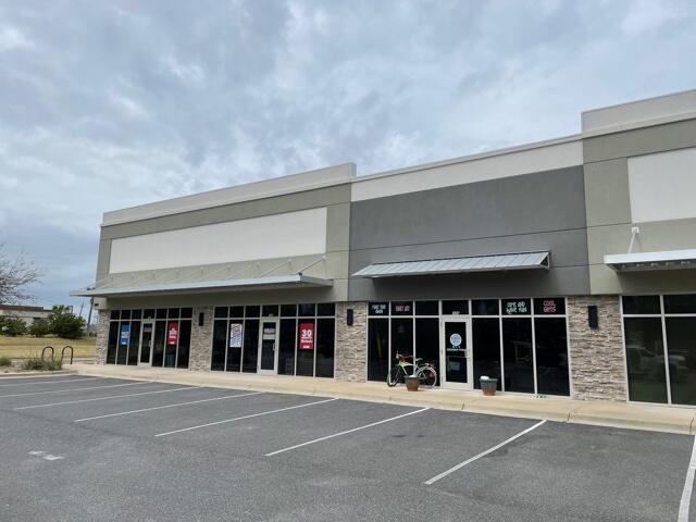 Excellent Retail / Warehouse space located in central Destin. This project is located directly behind Target with excellent access & tremendous parking. This 2000 SF space has a nice retail storefront and wide open floor plan except for a single restroom near the middle of the space along with a single rear wall not allowing you to see the rear roll up door. The entire space is fully heated & cooled. Adjacent tenants in this strip center include Fit Body Boot Camp, Rock Out Rock Climbing Gym, Volleyball training as well as others. This space was formerly occupied by Red Bird Art. Lease rate is $15/SF base rent + $2.50/SF NNN fees + 6.5% sales tax = $3106.25 per month. 3 year lease minimum lease term. Longer terms appreciated.