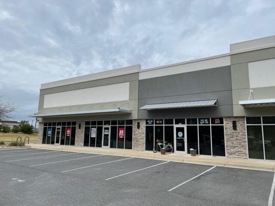 Excellent Retail / Warehouse space located in central Destin.  This project is located directly behind Target with excellent access & tremendous parking.  This 2000 SF space has a nice retail storefront and wide open floor plan except for a single restroom near the middle of the space along with a single rear wall not allowing you to see the rear roll up door.  The entire space is fully heated & cooled.  Adjacent tenants in this strip center include Fit Body Boot Camp, Rock Out Rock Climbing Gym, Volleyball training as well as others.  This space was formerly occupied by Red Bird Art.  Lease rate is $15/SF base rent + $2.50/SF NNN fees + 6.5% sales tax = $3106.25 per month.  3 year lease minimum lease term.  Longer terms appreciated.