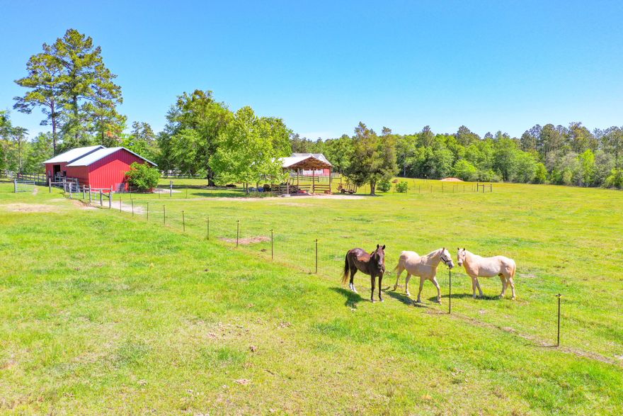 4BR/3BA brick home with a 1BR/1BA carriage house is situated on a beautiful serene 60 acre farm that includes pastureland with fencing & cross fencing, woodlands, stocked 5 acre pond, pole barn, 24x35 horse barn with 3 horse stalls, a tack room, and attached 2 car garage & workshop. You will love the 3 bay carport with the carriage house above. After a house fire in 2015, this home was TOTALLY REBUILT and upgraded to 2015 standards. Features in the kitchen include an island, quartz counter tops, stainless appliances and gas cooktop. The house also includes a big walk-in pantry; Anderson double pane windows; 2 HVAC units; two fireplaces, one wood burning & one gas; 100 gallon propane tank; 80 gallon water heater; a gutter system; fenced backyard; RV hookups; and an adorable chicken coop.