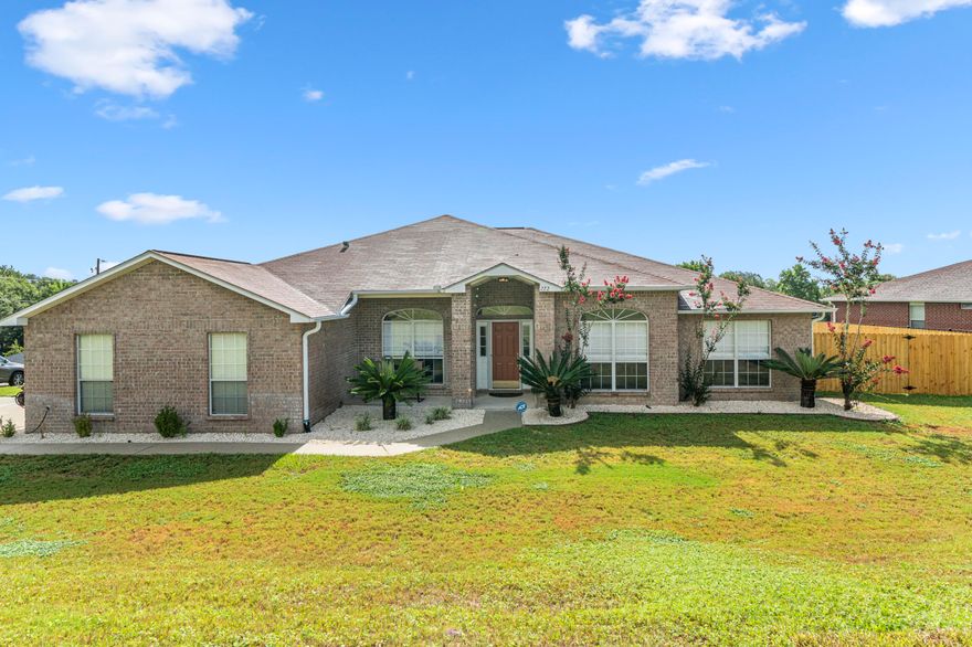 Brick home South of I-10 w/ over 2,500 sq. ft. and a side entry garage. The owners have put a ton of upgrades in this home and made it ready for you. GRANITE installed in the kitchen as well as refinished cabinets. Fresh paint throughout. Tile floors have been installed in all wet areas. New ceiling fans and lighting throughout as well as custom window blinds. The hall bath has an updated vanity and tile floors. The owners installed a new privacy fence on this spacious corner lot. This home has a split floor plan. The MBR features a garden tub with a separate shower, double sinks, and two separate closets. The large, eat-in, island kitchen can handle large gatherings and includes a formal dining room and a separate office.